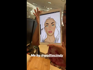 cindy showing her drawing to chantel